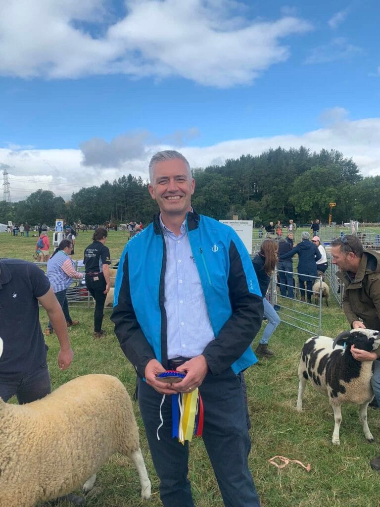 Local shows David Smith MP awarding prizes at a local show