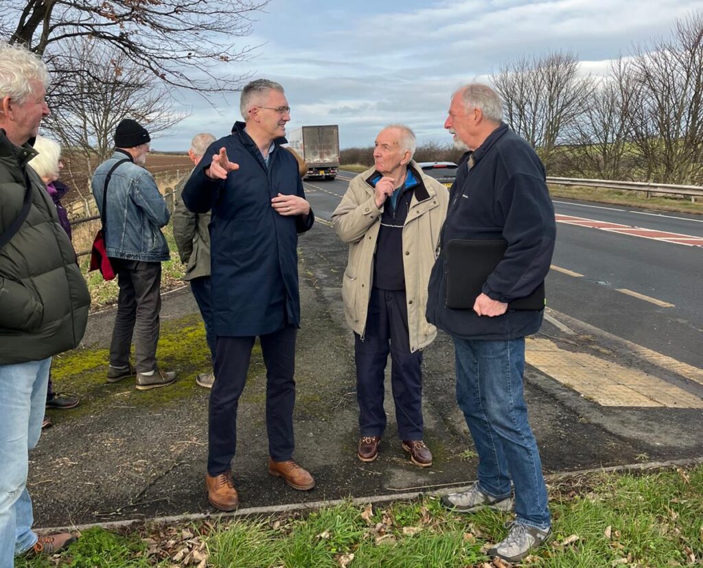 David Smith MP talking to residents from Norham about A1 safety.