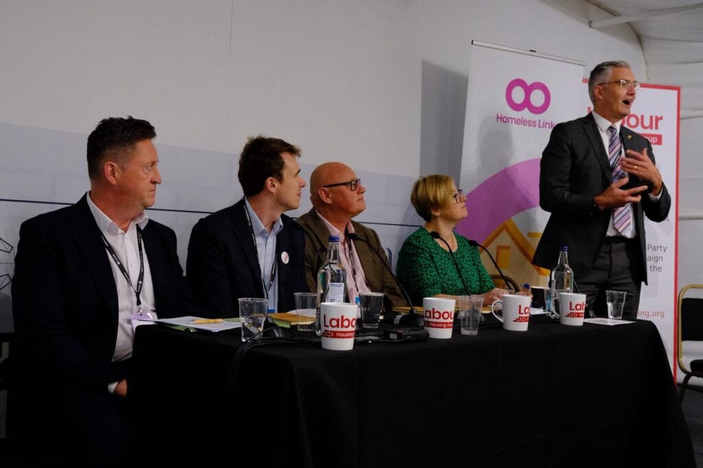 Oct 2025 Party Conf Homelessness (3) David speaking to a roomful of people at the report launch